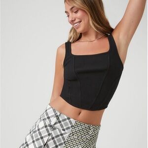 Forever 21. Size Large. Pleated plaid mini skirt.